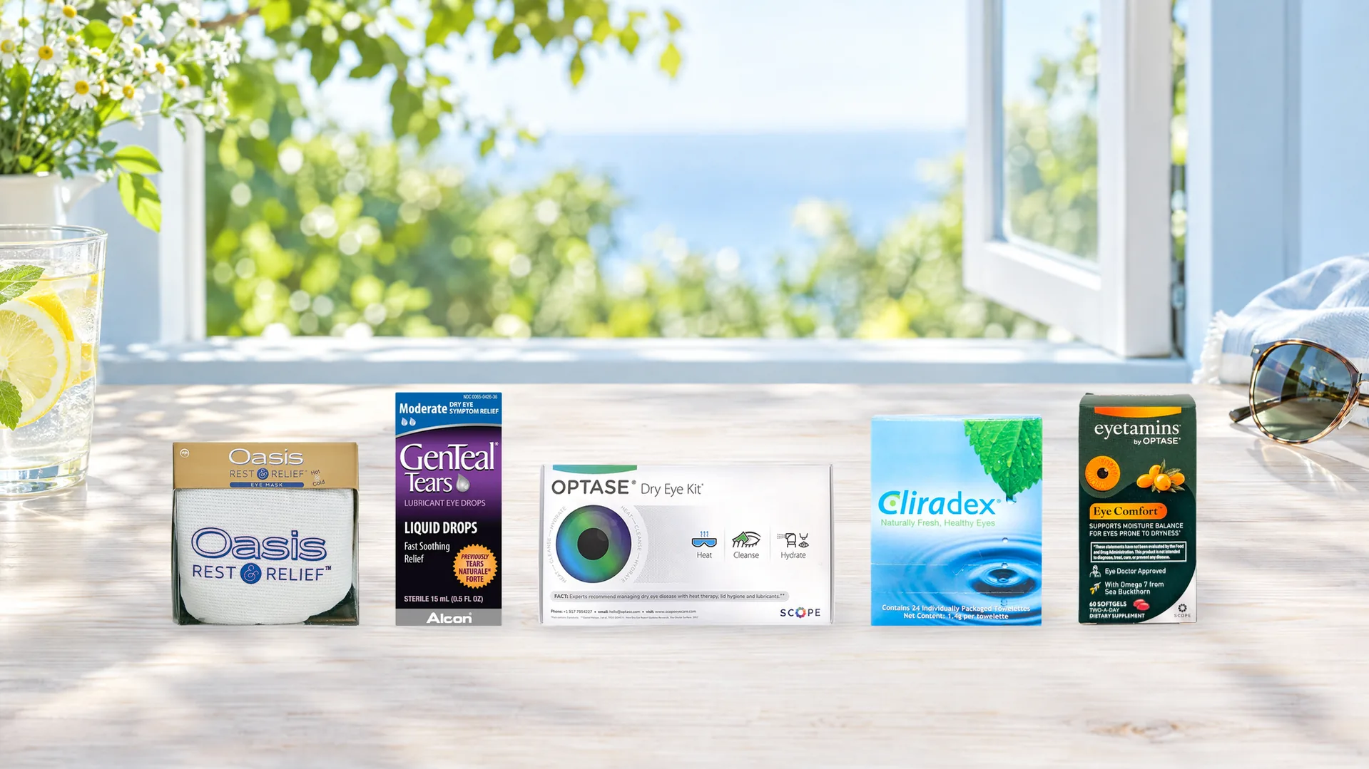 Summer Refresh Sale picks on a sunny table: Oasis Rest & Relief eye mask, GenTeal Tears Liquid Drops, Optase Dry Eye Kit, Cliradex eyelid wipes and Eyetamins Dry Eye Comfort supplement